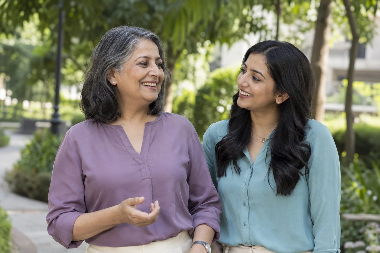 A woman and her adult daughter spending time together outdoors